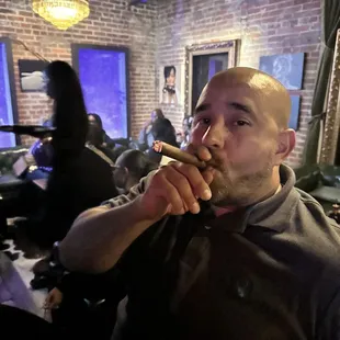 a man smoking a cigar