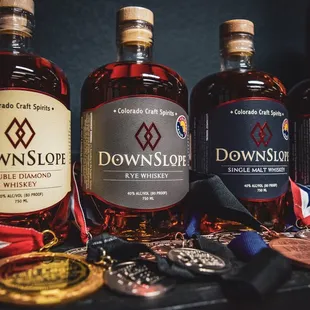 a row of bottles of bourbon