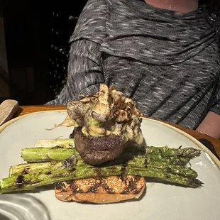 Filet on charred asparagus with toast