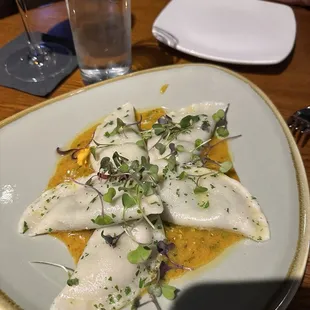 Dumplings with poached monkfish and pesto in red curry hollandaise sauce sooooo good