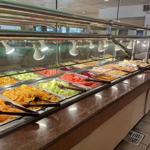 a variety of food in a buffet