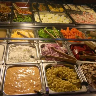 a variety of salads and condiments