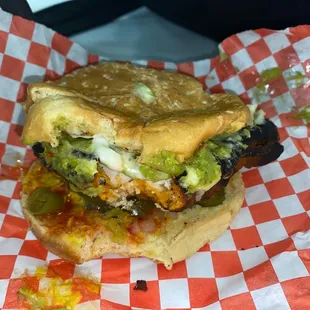 My chicken sandwich is so burnt that I can't taste the chicken and every bite taste burnt.