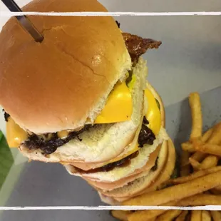 A stack of Sow n' Cows (bacon cheeseburger)