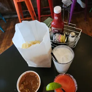 mexican food and drinks on a table