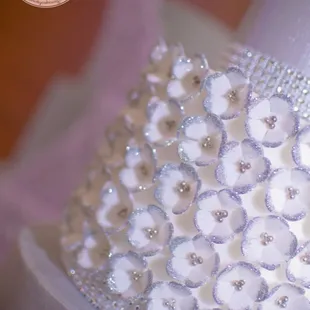 a closeup of a wedding cake