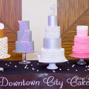 a variety of cakes on display