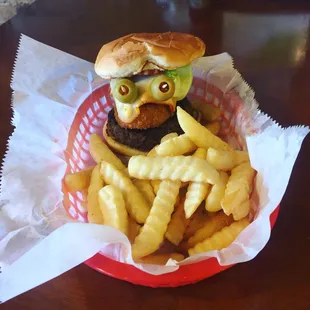 This is a &quot;Munster&quot; Burger, with an onion ring, munster cheese, and sabi sauce!
