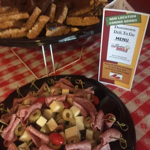 a platter of meat and cheese