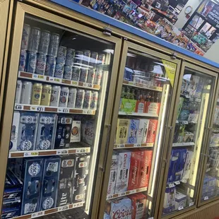 a row of beer coolers