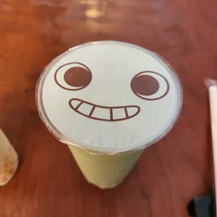 Matcha tea with lychee bubbles