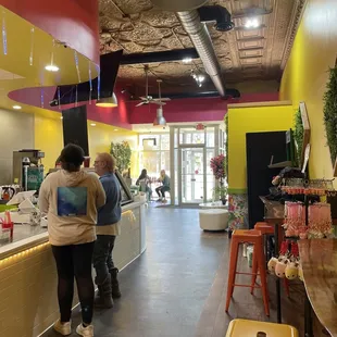 Bright and cheerful interior with lots of options for seating!