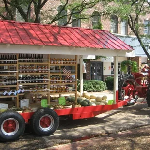 a tractor and produce stand