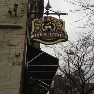 Sign says 'Bank Zstreet Wine &amp; Spirits', but my receipt says 'Downtown Liquors'.