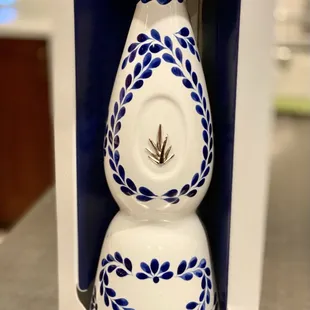 a blue and white vase
