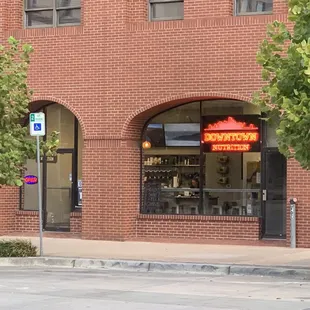 Front of Store. North side of Main St. Corner of Main and Robinson Ave