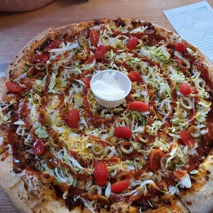 Taco pizza minus black olives sub in green olives.