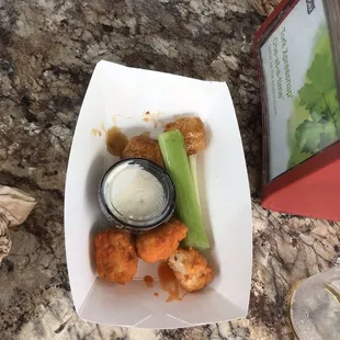 Chicken tenders or what they call them.  Look like lil pellets