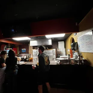 Pizza oven and walk up order area.