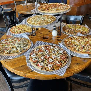 All of our specialty pizzas in one photo.
