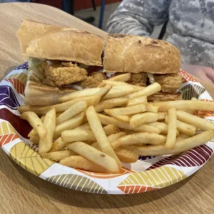 a plate of fries and a sandwich
