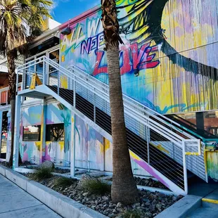 a colorful mural on the side of a building
