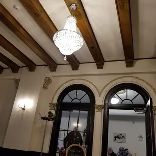 Look at those ceilings, the chandelier, windows!