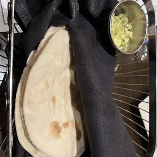 Bread - more like chewy tortillas.  Butter was good, though.