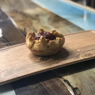 It&apos;s a meat pie!! and that&apos;s tomato sauce...