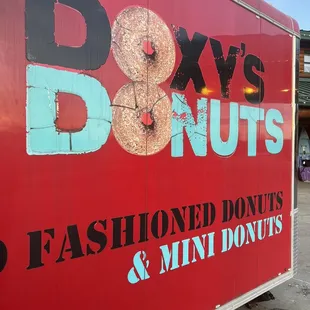 a red truck with a donut on it