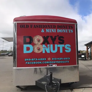 a sign for a donut shop