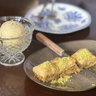 Homemade PISTACHIO BAKLAVA with scoop of pistachio ice cream