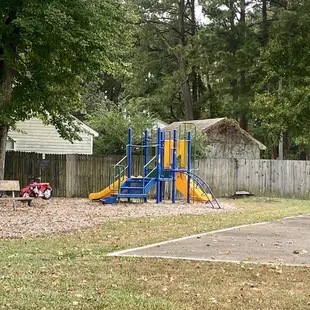 Very small play structure to the back of the park