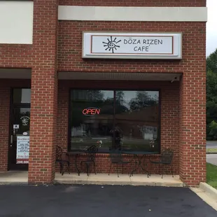 the entrance to a cafe