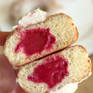 Inside of Cranberry Cloud Donut ($4.50) - cranberry curd filling, lime glaze, whipped cream cloud and lime sugar on top