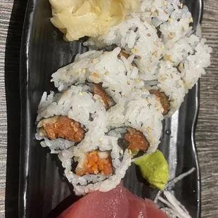 Spicy tuna roll and tuna sashimi.