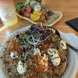 Crab rice, pickled plate, and yuzu white peach soda.
