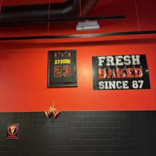 a sign on the wall of a restaurant