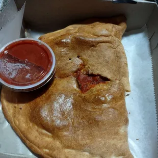 Calzone.....made my own....bacon, pineapple, black olives, pepperoni, marinara, and mozzarella