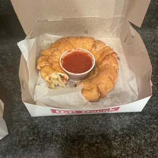 The Roni Rolls are cheese filled, not just breadsticks. Also very good and come with marinara so you dont need to order extra