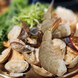 Seafood choices including crab, shrimp, clams