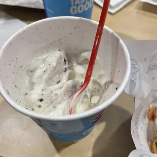 1/2 eaten small Oreo blizzard