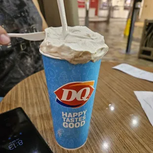 Someone trying to eat some of my overflowing s&apos;mores blizzard (flavor of the month). Lol. Best flavor ever.