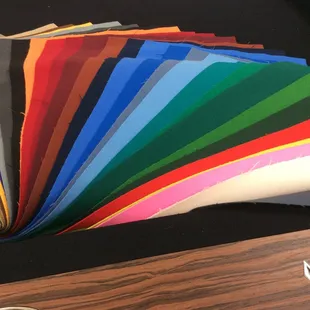 Approximately 30 colors of cloth to choose from.