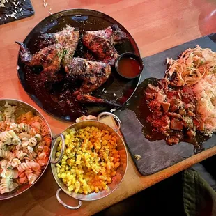 Rasta Pasta, Wood Smoked Whole Jerk Wings, Fiyah Corn, Wood smoked jerk jackfruit Dinna