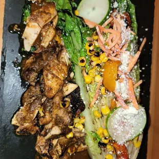 Grilled salad with jerk chicken