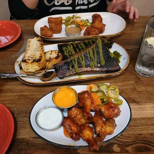 Carne asada eggrolls amd chicken wings