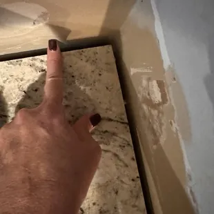 Gap between wall and granite