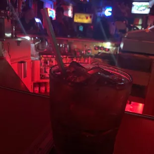 a drink in a glass with a straw