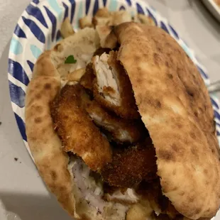 Chicken Schnitzel Pita! Thinly pounded chicken breast. It was fried to a perfect crunch and crispy!!
